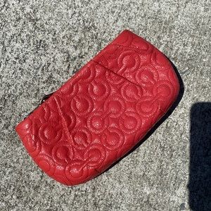 Coach wristlet. Used, outside like new, inside has some stains.